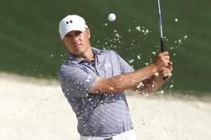 Jordan Spieth of the U.S. hits from a sand trap onto the tenth green during his practice round ahead of the 2015 Masters at Augusta National Golf Course in Augusta, Georgia April 8, 2015. REUTERS/Phil Noble